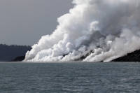 steam from lava<br>flowing into sea